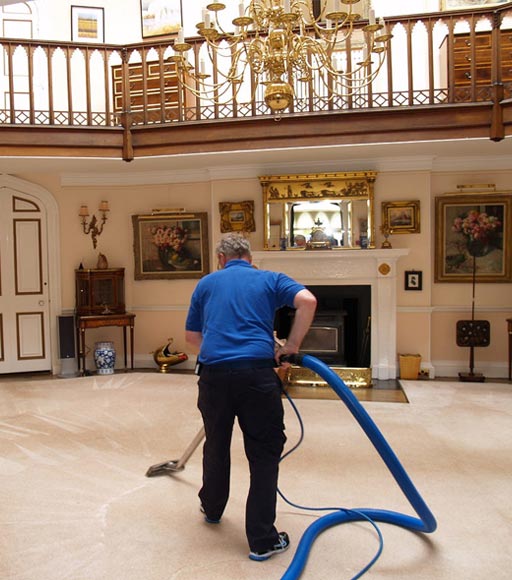 A man cleans the floors of palaces, villas and apartments